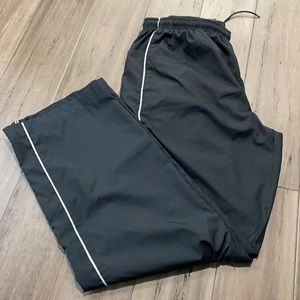 nike black sweatpants with white stripe